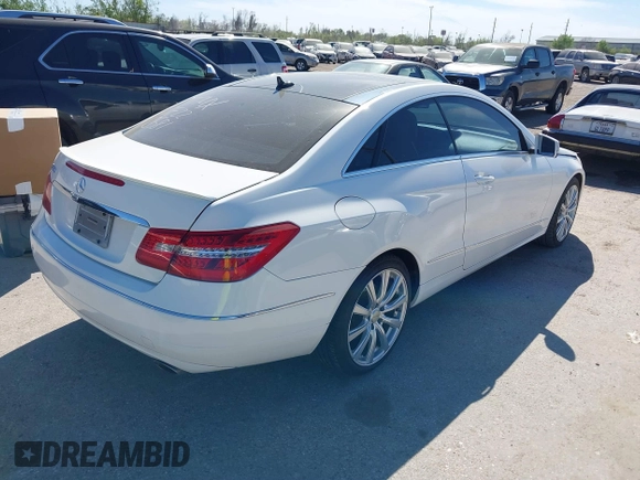 2013 Mercedes-Benz E 350 with VIN WDDKJ5KB1DF220581, listed as a IAAI auction lot 41809947 with 99,775 mi miles and . Bid and sale history available at DreamBid. Image 4.