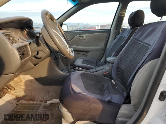 2001 Toyota Camry CE z VIN 4T1BG22K71U045151, wystawiony jako Copart lot #58041405 z przebiegiem 170 270 mil mil oraz Czysty tytuł • Clean title. Historia ofert i sprzedaży dostępna na DreamBid. Obrazek 7.