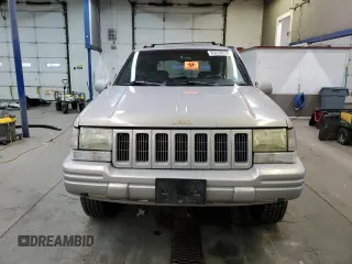 1998 Jeep Grand Cherokee Limited with VIN 1J4GZ78Y3WC216952, listed as a Copart auction lot 83239574 with 186,809 mi miles and Salvage Title. Bid and sale history available at carsss.com. Image 5.