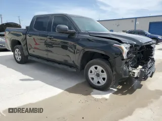 2023 Toyota Tundra SR with VIN 5TFKB5DB2PX062058, listed as a Copart auction lot 48930115 with 84,520 mi miles and Salvage title. Bid and sale history available at DreamBid. Image 4.