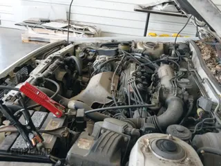 1987 Toyota Camry LE z VIN JT2SV22E3H3012242, wystawiony jako IAAI lot #42526925 z przebiegiem 191 564 mil mil oraz . Historia ofert i sprzedaży dostępna na DreamBid. Obrazek 14.