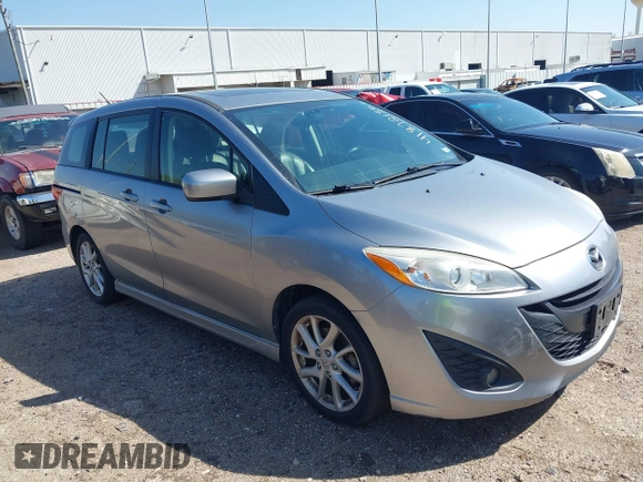 2012 Mazda Mazda5 Grand Touring with VIN JM1CW2DL2C0129518, listed as a IAAI auction lot 41872136 with 129,323 mi miles. Bid and sale history available at carsss.com. Image 1.
