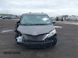 2015 Toyota Sienna LE AAS with VIN 5TDKK3DC1FS615090, listed as a IAAI auction lot 41965112 with 116,745 mi miles. Bid and sale history available at carsss.com. Image 12.