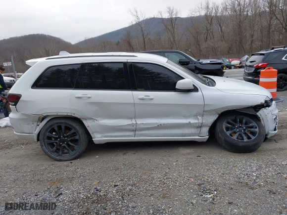 2018 Jeep Grand Cherokee Laredo E with VIN 1C4RJFAG6JC152867, listed as a IAAI auction lot 41486884 with 67,115 mi miles. Bid and sale history available at carsss.com. Image 13.