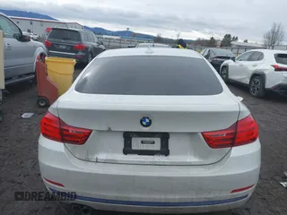 2016 BMW 4 Series 428i xDrive with VIN WBA4C9C54GG135615, listed as a IAAI auction lot 41655368 with 156,851 mi miles and . Bid and sale history available at carsss.com. Image 17.