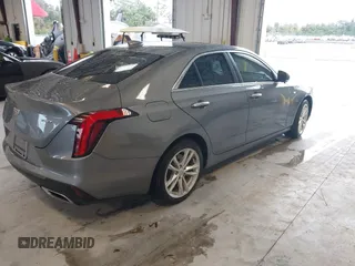 2021 Cadillac CT4 Luxury with VIN 1G6DA5RK4M0147723, listed as a IAAI auction lot 41646082 with 14,459 mi miles and . Bid and sale history available at DreamBid. Image 4.