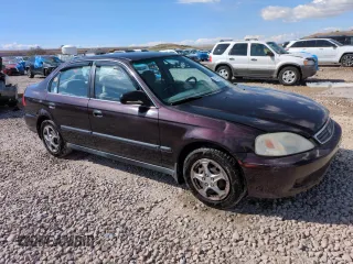 2000 Honda Civic LX with VIN 1HGEJ6673YL047996, listed as a Copart auction lot 51451505 with 216,329 mi miles and Clean Title. Bid and sale history available at DreamBid. Image 4.