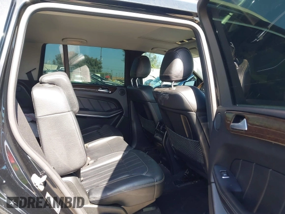2014 Mercedes-Benz GL 450 with VIN 4JGDF7CE7EA414390, listed as a IAAI auction lot 42554915 with 114,997 mi miles and . Bid and sale history available at DreamBid. Image 8.