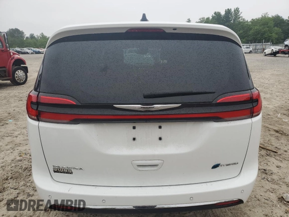 2023 Chrysler Pacifica Hybrid Limited with VIN 2C4RC1S70PR543587, listed as a Copart auction lot 60439795 with 11,558 mi miles and Salvage title. Bid and sale history available at DreamBid. Image 6.
