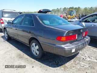 2000 Toyota Camry CE z VIN 4T1BG22K5YU989265, wystawiony jako IAAI lot #41800338 z przebiegiem 381 964 mil mil oraz . Historia ofert i sprzedaży dostępna na DreamBid. Obrazek 3.