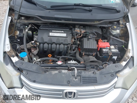 2010 Honda Insight LX with VIN JHMZE2H57AS008203, listed as a IAAI auction lot 42240869 with 150,562 mi miles and . Bid and sale history available at DreamBid. Image 10.