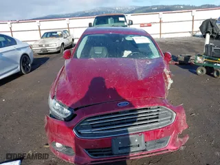 2015 Ford Fusion Titanium Hybrid with VIN 3FA6P0RU2FR199207, listed as a IAAI auction lot 41331947 with 1 mi miles. Bid and sale history available at carsss.com. Image 12.