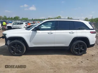 2023 Jeep Grand Cherokee Altitude with VIN 1C4RJHAG4P8106056, listed as a IAAI auction lot 42275021 with 27,251 mi miles and . Bid and sale history available at DreamBid. Image 14.