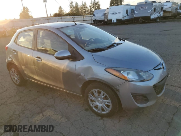 2014 Mazda 2 Sport with VIN JM1DE1KZ6E0184808, listed as a Copart auction lot 83399384 with 96,866 mi miles and Salvage Title. Bid and sale history available at carsss.com. Image 4.