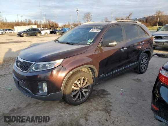 2015 Kia Sorento LX с VIN 5XYKTCA63FG585261, выставлен на аукционе Copart как лот 84011454 с пробегом 148 135 миль миль и Списание • Salvage title. История ставок и продаж доступна на DreamBid. Изображение 1.
