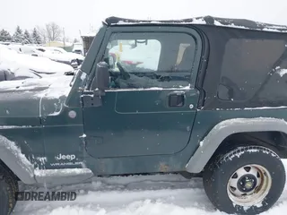 2004 Jeep Wrangler SE with VIN 1J4FA29154P778915, listed as a IAAI auction lot 41245325 with 205,852 mi miles and . Bid and sale history available at DreamBid. Image 14.