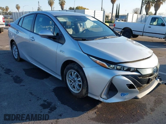 2021 Toyota Prius LE with VIN JTDKAMFP1M3196066, listed as a IAAI auction lot 41752179 with 90,200 mi miles and . Bid and sale history available at DreamBid. Image 1.