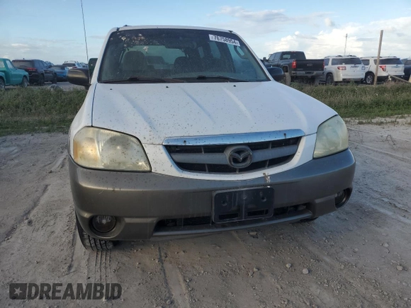 2002 Mazda Tribute LX with VIN 4F2YU09182KM09244, listed as a Copart auction lot 76758954 with Not Provided miles and Non Repairable. Bid and sale history available at carsss.com. Image 5.