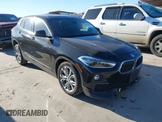 2019 BMW X2 sDrive28i with VIN WBXYJ3C50KEP77327, listed as a IAAI auction lot 40922194 with 94,672 mi miles. Bid and sale history available at carsss.com. Image 1.
