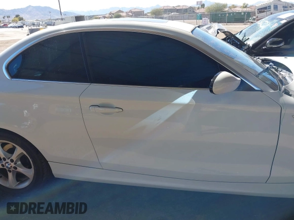 2009 BMW 1 Series 128i with VIN WBAUP73549VK74523, listed as a IAAI auction lot 41337097 with 108,608 mi miles and . Bid and sale history available at carsss.com. Image 13.