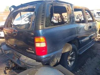 2003 GMC Yukon SLT with VIN 1GKEK13Z03R218556, listed as a IAAI auction lot 41019548 with 1 mi miles. Bid and sale history available at carsss.com. Image 4.