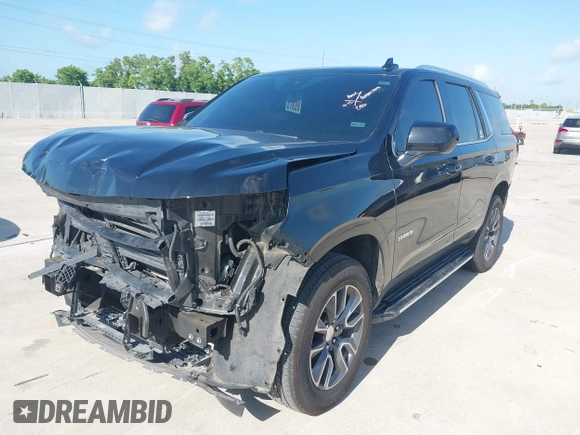 2023 Chevrolet Tahoe LT z VIN 1GNSCNKDXPR477061, wystawiony jako IAAI lot #42225743 z przebiegiem 57 077 mil mil oraz . Historia ofert i sprzedaży dostępna na DreamBid. Obrazek 17.