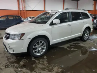 2013 Dodge Journey Crew with VIN 3C4PDCCG1DT637971, listed as a Copart auction lot 82694014 with 151,895 mi miles and Clean title. Bid and sale history available at DreamBid. Image 1.