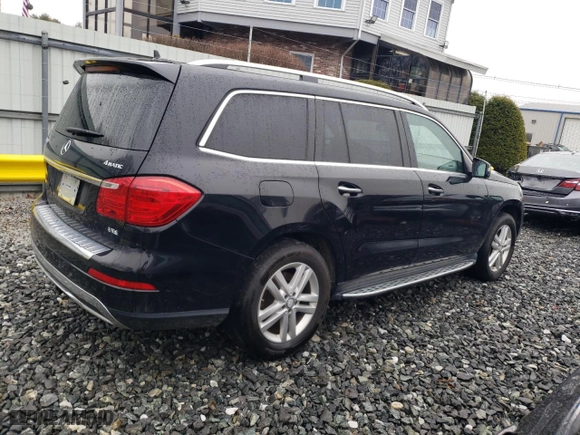 2015 Mercedes-Benz GL-Class GL 450 with VIN 4JGDF6EE6FA489428, listed as a Copart auction lot 51082565 with 138,728 mi miles and Clean Title. Bid and sale history available at carsss.com. Image 3.