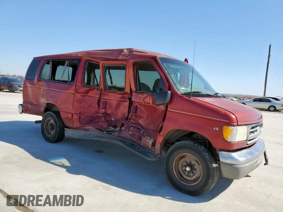 2001 Ford Econoline Passenger XL with VIN 1FBSS31L21HA40360, listed as a Copart auction lot 46909575 with 317,780 mi miles and Salvage title. Bid and sale history available at DreamBid. Image 4.