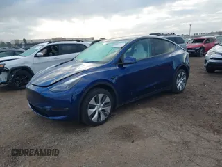 2023 Tesla Model Y Long Range with VIN 7SAYGDEE6PF947827, listed as a IAAI auction lot 41443524 with 12,381 mi miles and . Bid and sale history available at DreamBid. Image 19.