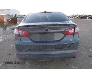 2015 Ford Fusion SE Hybrid with VIN 3FA6P0LU1FR219908, listed as a IAAI auction lot 41272688 with 310,452 mi miles. Bid and sale history available at carsss.com. Image 17.