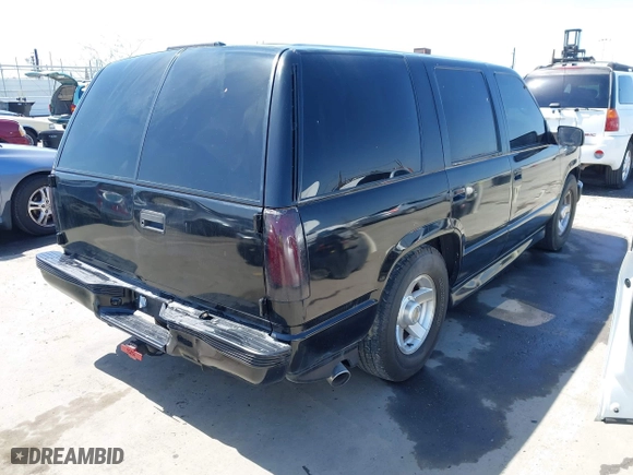 2000 Chevrolet Tahoe Limited with VIN 1GNEC13R7YR195106, listed as a IAAI auction lot 41948564 with 190,250 mi miles. Bid and sale history available at carsss.com. Image 4.