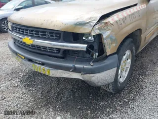 1999 Chevrolet Silverado 1500 LS with VIN 2GCEC19T8X1142580, listed as a IAAI auction lot 41932320 with 238,377 mi miles. Bid and sale history available at carsss.com. Image 6.