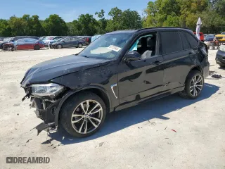 2015 BMW X5 xDrive35i with VIN 5UXKR0C57F0P15080, listed as a Copart auction lot 50720945 with 100,074 mi miles and Salvage Title. Bid and sale history available at carsss.com. Image 1.