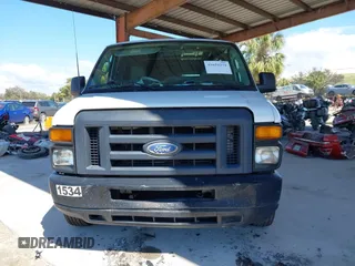 2014 Ford Econoline Cargo Commercial with VIN 1FTNE1EW1EDA66485, listed as a IAAI auction lot 41654271 with 304,974 mi miles and . Bid and sale history available at DreamBid. Image 12.