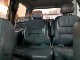 2003 Honda Odyssey EX-L z VIN 5FNRL18943B020961, wystawiony jako Copart lot #86009874 z przebiegiem 155 993 mil mil oraz Szkoda całkowita • Salvage title. Historia ofert i sprzedaży dostępna na DreamBid. Obrazek 10.