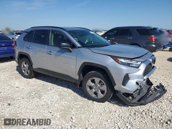 2023 Toyota RAV4 Hybrid LE with VIN JTMLWRFV0PD207803, listed as a Copart auction lot 55694695 with 13,198 mi miles and Salvage title. Bid and sale history available at DreamBid. Image 4.