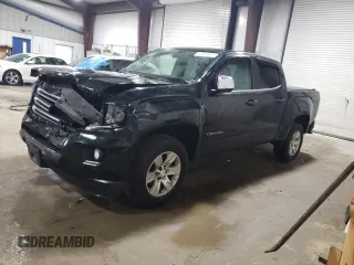 2015 GMC Canyon 4WD SLE with VIN 1GTG6BE38F1258880, listed as a Copart auction lot 57887664 with 142,346 mi miles and Salvage Title. Bid and sale history available at carsss.com. Image 1.