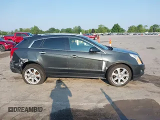 2014 Cadillac SRX Performance Collection with VIN 3GYFNFE35ES663320, listed as a IAAI auction lot 42480235 with 112,406 mi miles and . Bid and sale history available at DreamBid. Image 13.