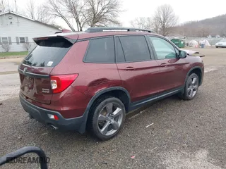 2019 Honda Passport Touring with VIN 5FNYF8H99KB005625, listed as a IAAI auction lot 41905030 with 64,998 mi miles. Bid and sale history available at carsss.com. Image 4.
