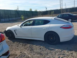 2010 Porsche Panamera S with VIN WP0AB2A79AL063975, listed as a IAAI auction lot 42093122 with 114,908 mi miles. Bid and sale history available at carsss.com. Image 14.