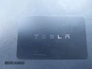 2020 Tesla Model 3 Standard Range Plus with VIN 5YJ3E1EA4LF745491, listed as a IAAI auction lot 41186726 with 74,575 mi miles and . Bid and sale history available at DreamBid. Image 11.