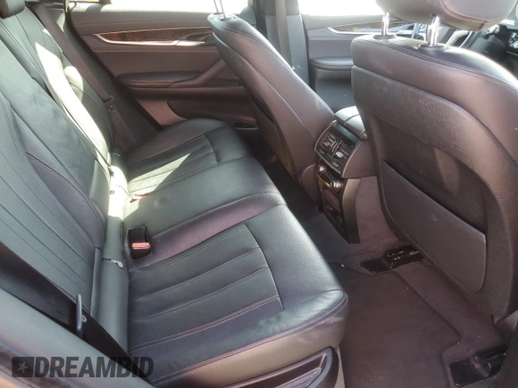 2018 BMW X6 sDrive35i z VIN 5UXKU0C54J0G69704, wystawiony jako Copart lot #57335475 z przebiegiem 61 777 mil mil oraz Szkoda całkowita • Salvage title. Historia ofert i sprzedaży dostępna na DreamBid. Obrazek 11.