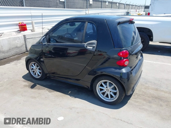 2014 Smart fortwo Pure with VIN WMEEJ3BA1EK752202, listed as a IAAI auction lot 42672207 with 65,736 mi miles and . Bid and sale history available at DreamBid. Image 3.