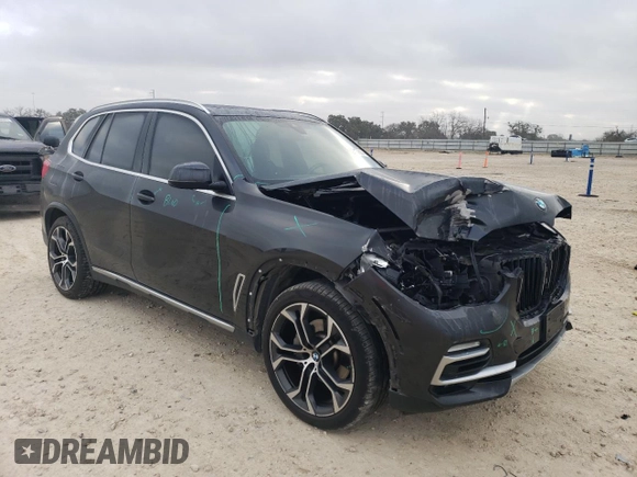 2021 BMW X5 sDrive40i with VIN 5UXCR4C09M9F79014, listed as a Copart auction lot 43667255 with 54,431 mi miles and Salvage Title. Bid and sale history available at carsss.com. Image 4.