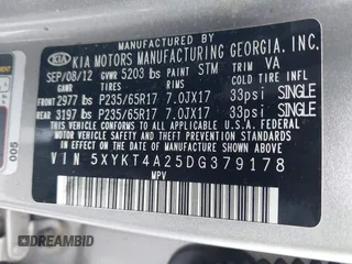2013 Kia Sorento LX with VIN 5XYKT4A25DG379178, listed as a IAAI auction lot 41080352 with 112,927 mi miles. Bid and sale history available at carsss.com. Image 9.