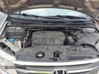 2013 Honda Odyssey LX with VIN 5FNRL5H27DB075559, listed as a IAAI auction lot 42007141 with Not Provided miles and . Bid and sale history available at carsss.com. Image 10.
