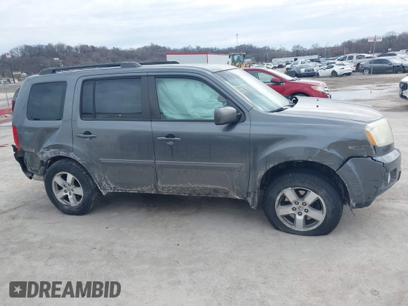 2011 Honda Pilot EX-L with VIN 5FNYF4H59BB042308, listed as a IAAI auction lot 41635511 with 196,736 mi miles and . Bid and sale history available at carsss.com. Image 13.