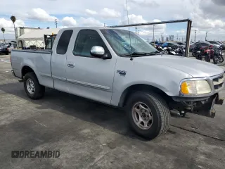 1998 Ford F-150 XL with VIN 1FTRX17L3WKB36791, listed as a Copart auction lot 42141915 with 201,067 mi miles and Salvage title. Bid and sale history available at DreamBid. Image 4.