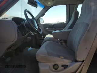 1999 Ford F-150 XL with VIN 1FTRX17L2XKB78998, listed as a Copart auction lot 65004535 with 155,271 mi miles and Salvage title. Bid and sale history available at DreamBid. Image 7.